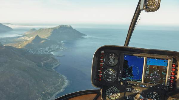 Cockpit controls and sea in background