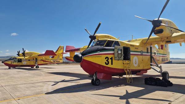 Yellow Italian planes parked