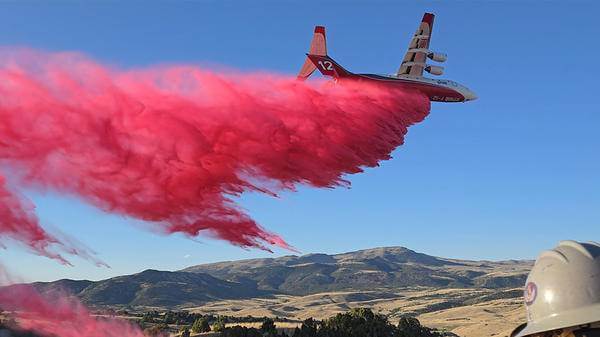 Neptune plane dropping fire retardant one!