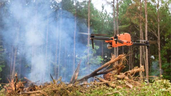 Aerial firefighting drone in woodland