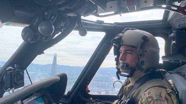 Helicopter pilot - Alyxandra Demetrides in cockpit