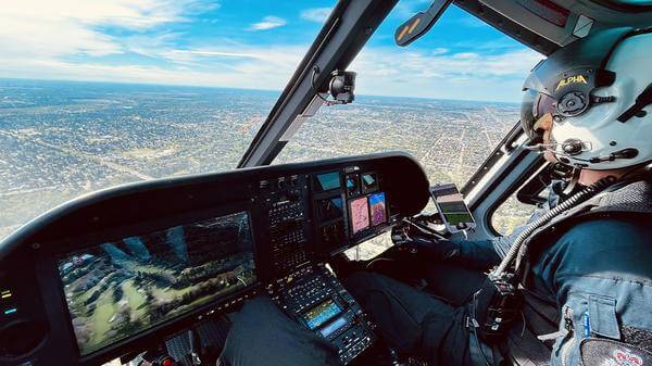 Helicopter pilot in cockpit