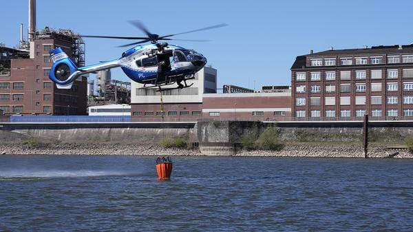 Helicopter picking up water