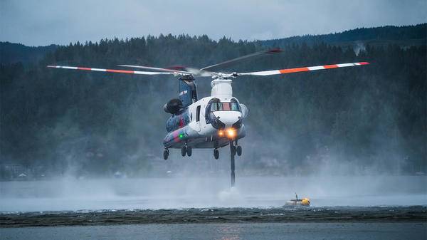 Helicopter flying over water