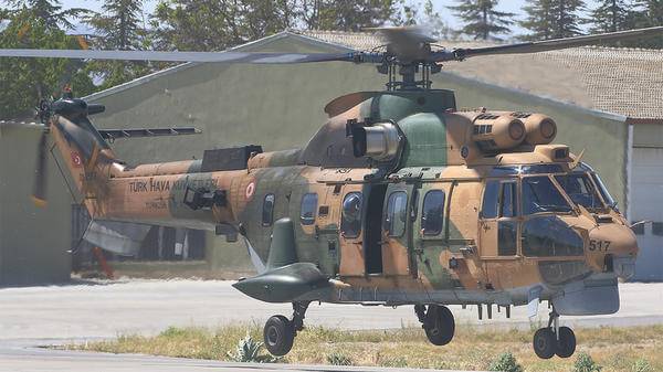 Brown and green camo helicopter