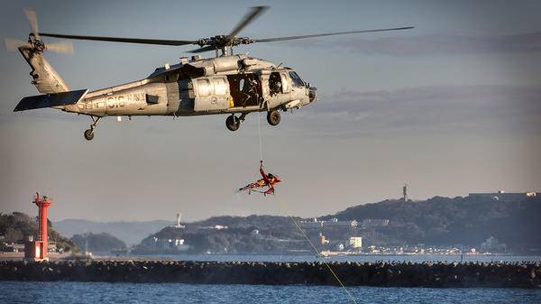 Man hoisted out of helicopter