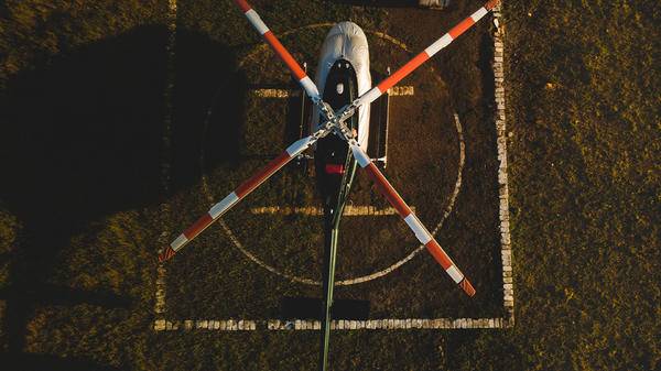 Helicopter parked on pad