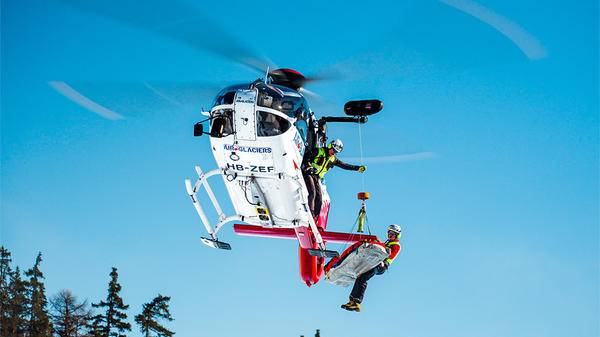 SAR worker hoisted out of helicopter
