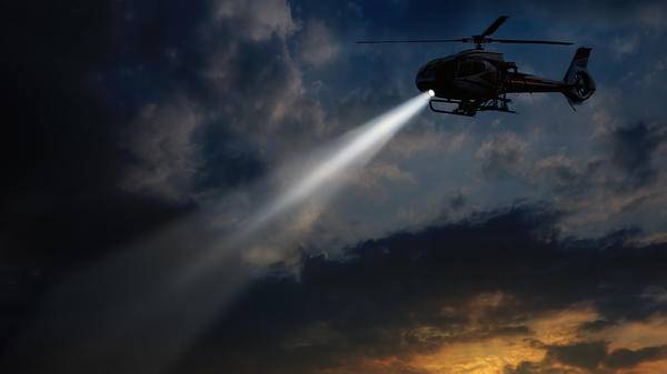 Helicopter with beam coming out