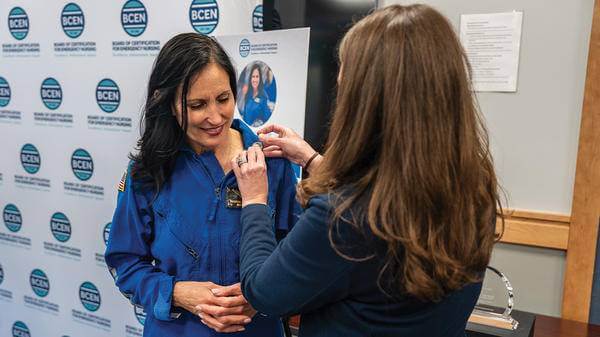 Female aviation specialist being given medal