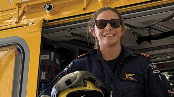 Female rescue worker posing