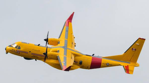 Yellow canadian fixed wing plane