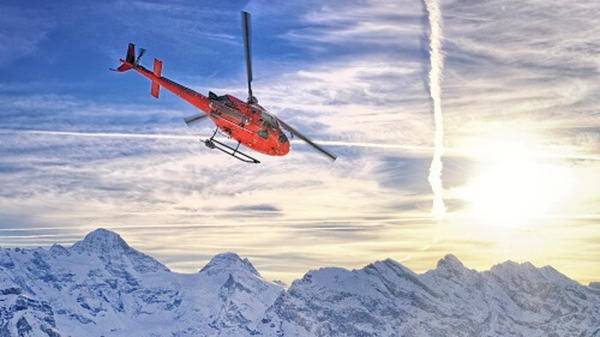 Helicopter flight over mountain range