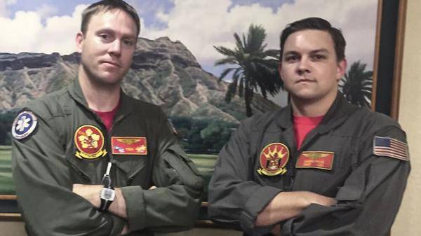 Navy helicopter crew members saves tourist