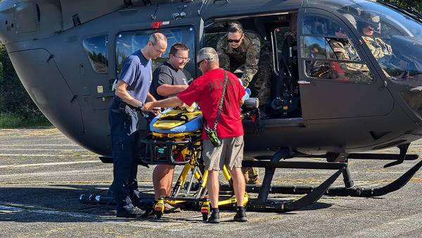 Patient being loaded onto helicopter