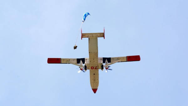 Underneath of plane flying in the sky