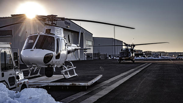 Helicopter parked in snow