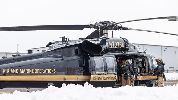 Helicopter parked in snow