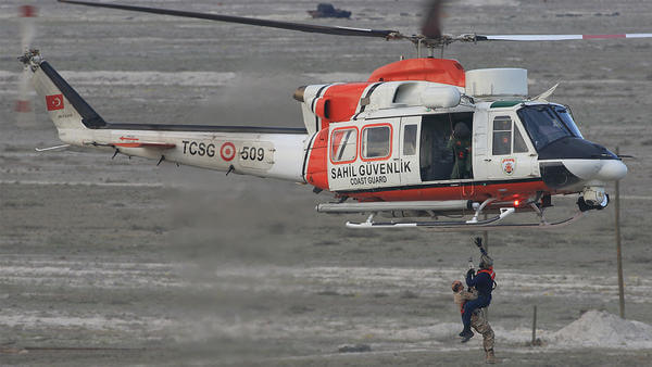 Orange and white helicopter