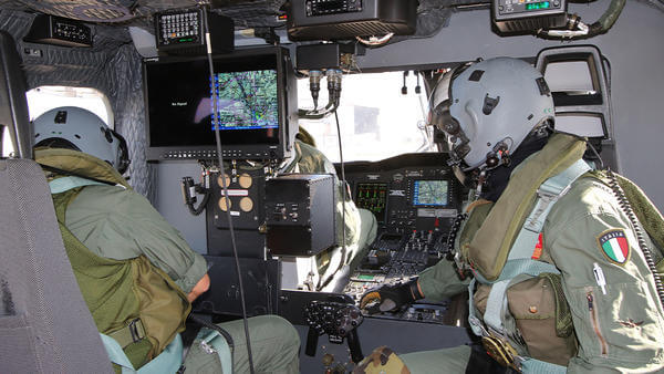Inside of military helicopter with crew