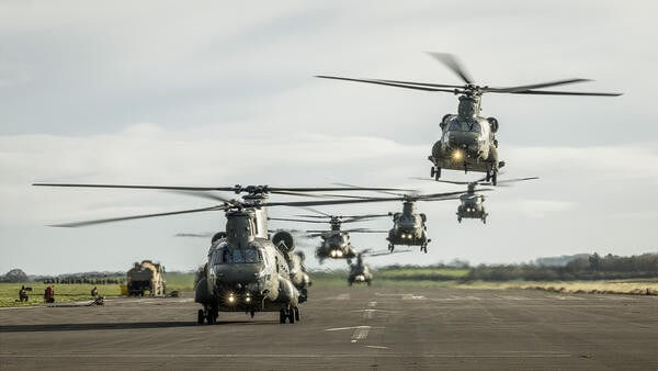 Helicopters landing in convoy