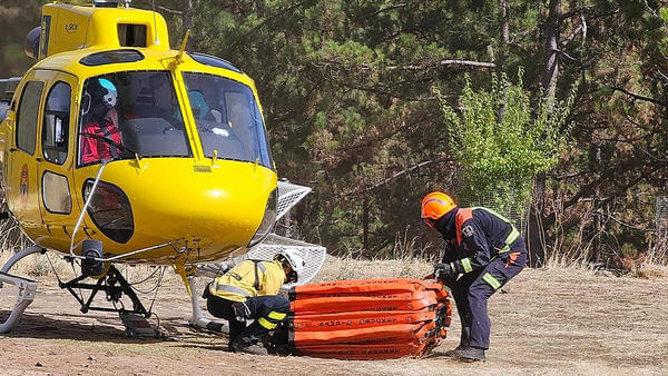 Workers sorting out firefighting helicopter