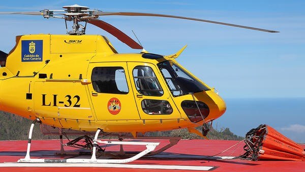 Yellow helicopter parked