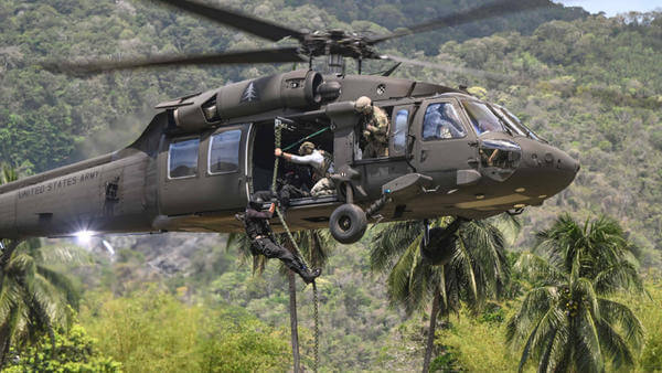 Police hoisted out of helicopter