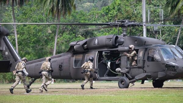 Military running into helicopter